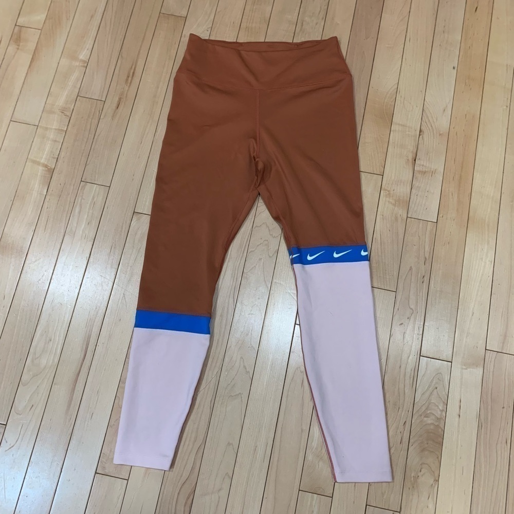 Nike Colorblock High-Waist Leggings in Rust, Pink & Blue